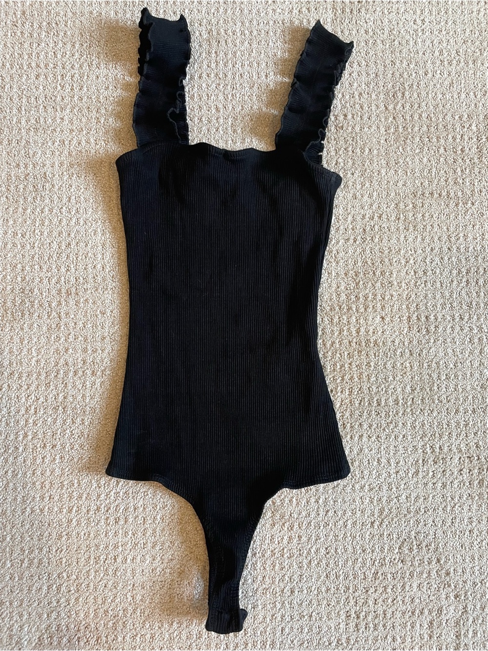 Ribbed Black Ruffle Strap Bodysuit
